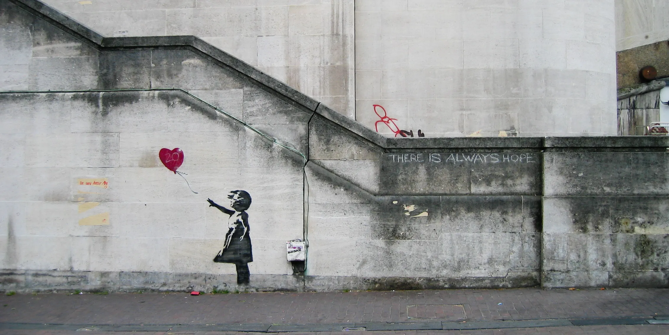 Street art graffiti from contemporary artist - Banksy. Name of the art - girl with balloon.